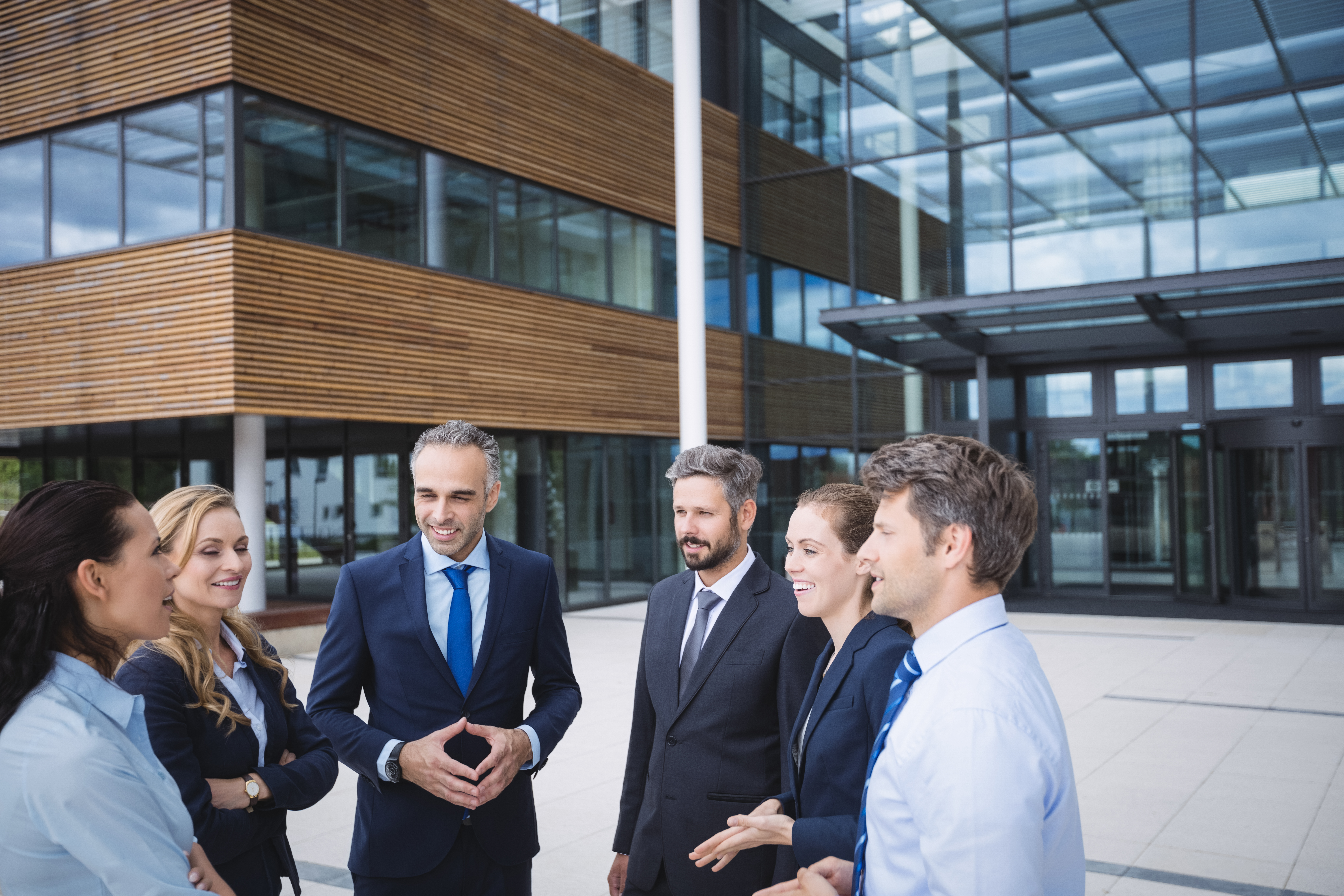 Business team outside an office